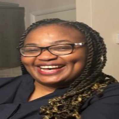 Dora Ekiko, Registered Manager